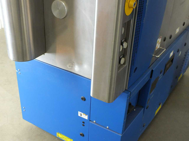 Lambda Physik NovaLine K2020B – side/corner view showing blue lower cabinet and stainless steel upper section