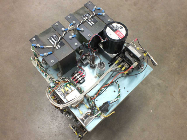 Staco 30M6020-2P motorized variable transformer — overhead top-down view of control shelf showing motor, capacitor, control transformers, relay contactors, terminal blocks, and multicolor control wiring