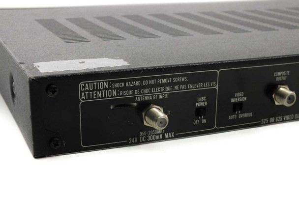 Standard MT620 rear panel left section — antenna RF input label (950-2050 MHz, 24V DC 300mA), LNBC power switch, composite video output F-connector, and bilingual caution label