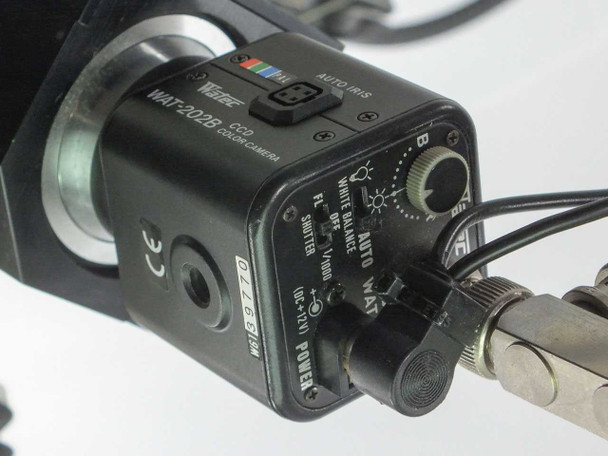 Watec WAT-202B CCD color camera mounted on Fineplacer optical column, showing auto iris, white balance, and power controls