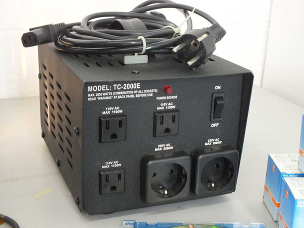 TC-2000E up/down voltage converter, model TC-2000E, showing 110V and 220V AC outlets (max 1100W and 2000W), power switch, and EU schuko input cable