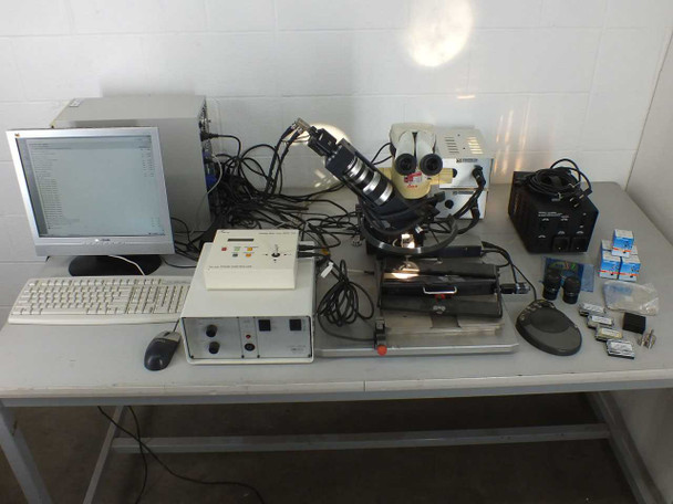 Finetech Fineplacer PCB rework station full system overview on workbench with Leica MZ6 microscope, PC, monitor, keyboard, controllers, and accessories