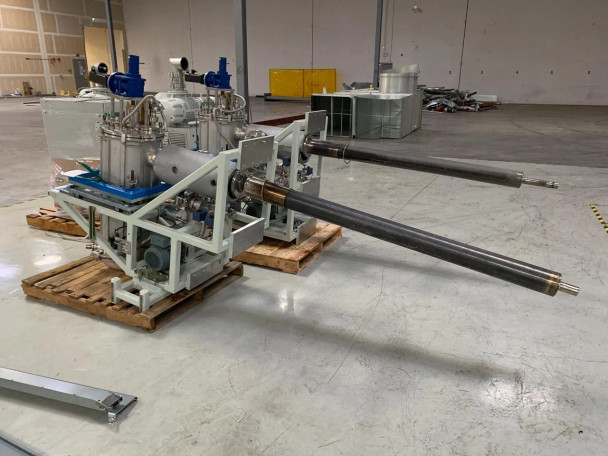 Riber Jet 40K selenium cracker full system front-left view on pallet showing dual linear nozzle tubes and vacuum reservoir assembly