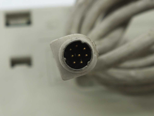 Sun Microsystems 3201005-02 keyboard 8-pin DIN connector closeup showing gold pins