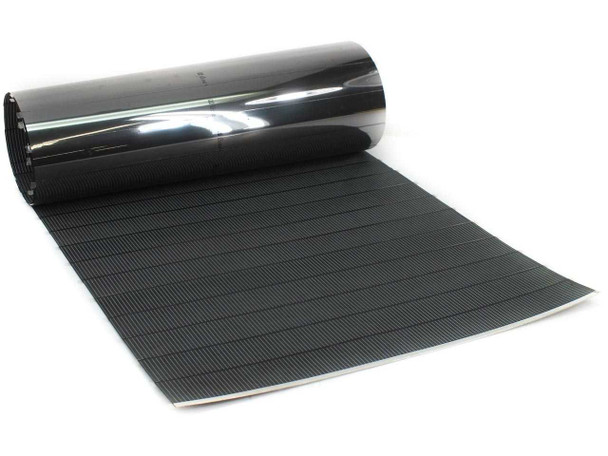 Solopower SP1 CIGS flexible solar cell string partially unrolled showing stainless steel substrate and cell surface, rolled end visible at top
