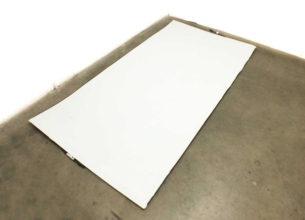 Reverse (back) side of SoloPower SP3L-220 flexible solar panel showing all-white backing material with mounting grommets visible at corners