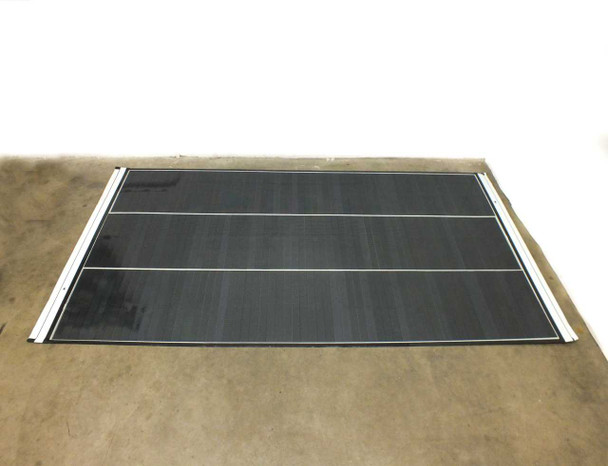 SoloPower SP3L-160 flexible solar panel flat on floor — wider angle view showing full panel dimensions and flexible substrate