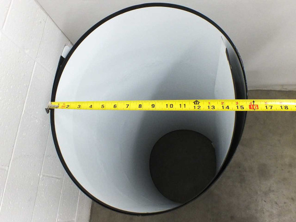 SoloPower SP3L-160 flexible solar panel rolled into cylinder, viewed from above with tape measure showing approximately 16-inch interior diameter