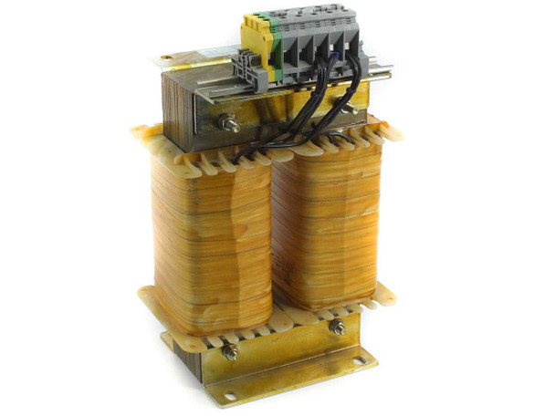 Jaspers Transformatoren VES5 8kVA transformer — left/rear angle view showing terminal wiring and open-frame laminated core construction
