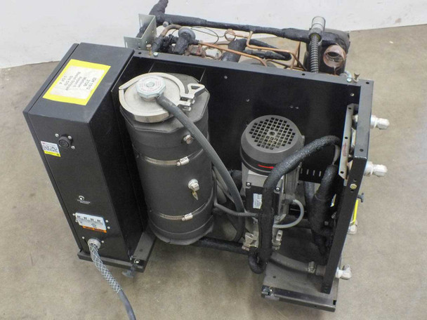 Affinity FWE-005C-CD38CA chiller – interior top-open view showing compressor, circulation pump motor, refrigerant plumbing, and copper tubing with covers removed