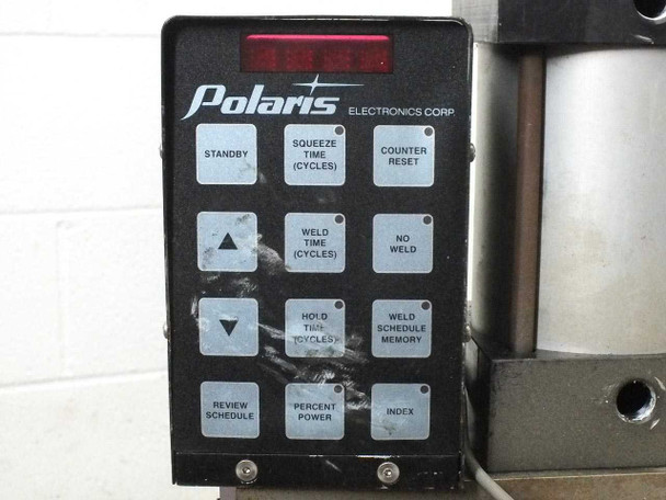 Polaris Electronics Corp control panel close-up – keypad showing Standby, Squeeze Time, Weld Time, Hold Time, Percent Power, Index, Weld Schedule Memory, and Counter Reset buttons with LED display