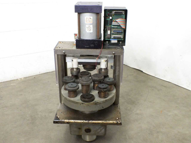 Polaris Accu-Weld 7100 weld head – rear-right view showing rotary indexing table with 10 weld tooling fixtures and open electronics enclosure at upper right