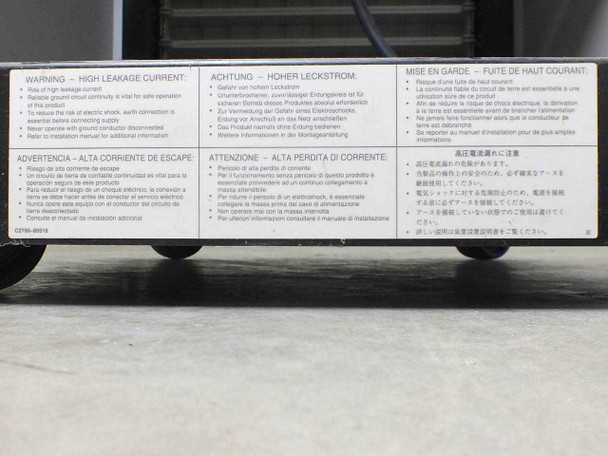 HP C2785A rack enclosure warning label — high leakage current warning in English, German, French, Spanish, Italian, and Japanese
