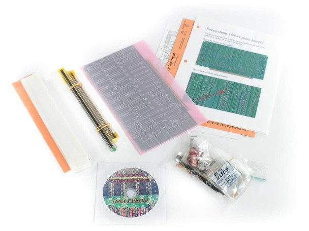 Ithaca Intersystems 16/64 EPROM Board Kit contents laid out — PCB in anti-static sleeve, component bag, CD-ROM disc, reference sheets, and conversion chart