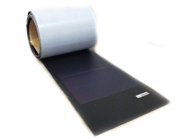 Single Uni-Solar PVL-128 panel partially unrolled showing white backing, purple cell surface, and solder point label