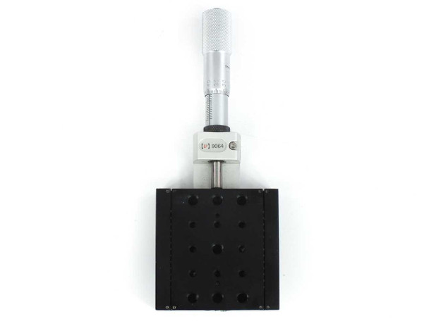Newport 9064-X translation stage with micrometer — top-down view showing mounting hole pattern and micrometer actuator bracket with model label