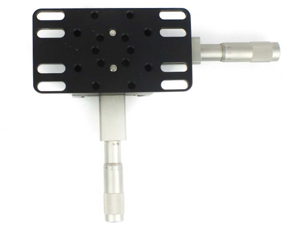 Newport 460P-X XY stacked stage pair — top-down view showing full tapped hole pattern on top plate and both SM-25 micrometers oriented orthogonally