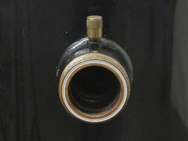 Copeland ZR19M3-TWD-561 discharge port close-up showing copper fitting with brass cap and sealant residue