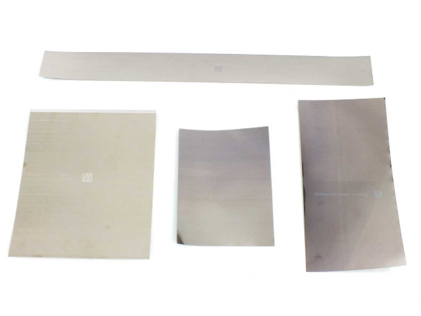 Nanosolar SoloPower flexible CIGS solar cell sample pack — reverse side of all four cells showing metallic stainless steel and flexible substrate backing