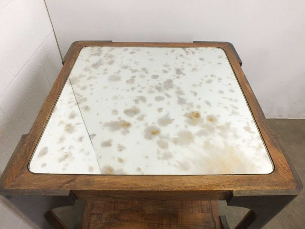 Artistica Tuco 155-260 end table — close-up top view showing antique mirror surface with characteristic aged spotting