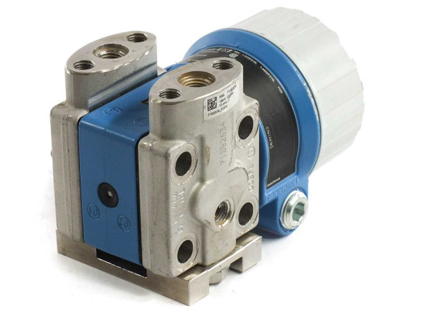 Endress+Hauser PMD55 – right-side view showing process connections, manifold ports, and QR code label on transmitter body