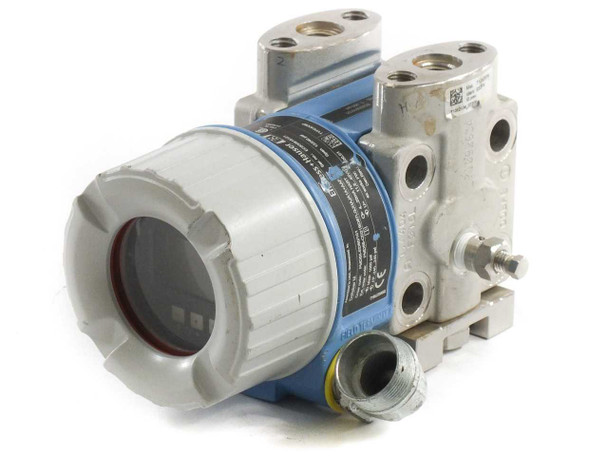 Endress+Hauser PMD55 – rear three-quarter view showing transmitter housing, manifold block, and conduit entry