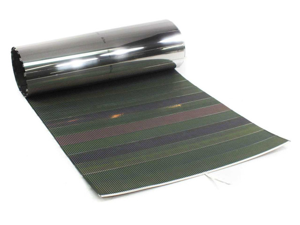 Solopower SP1 CIGS raw solar cell string partially unrolled showing flexible stainless steel substrate and CIGS cell striping