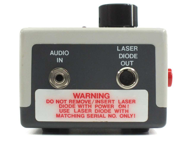 Newport FK-DRV – right side panel showing Audio In and Laser Diode Out 3.5mm jacks with warning label: do not insert/remove laser diode with power on