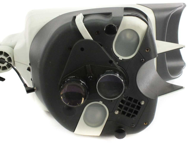 Vision Engineering Mantis microscope — front face of head with objectives removed, showing internal optics, lens ports, and ventilation grille