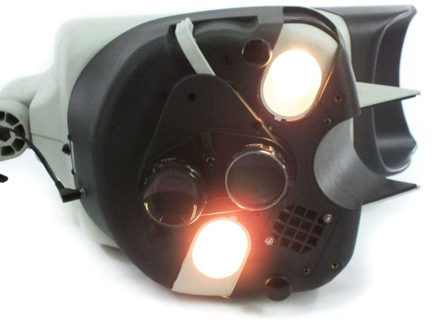 Vision Engineering Mantis microscope — front face of head with objectives removed and both halogen illuminators lit