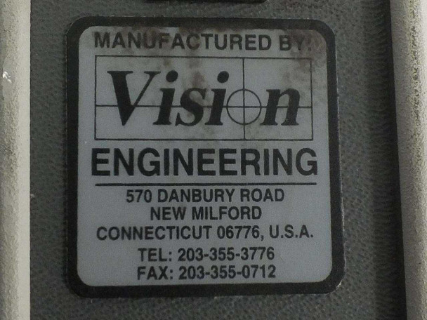 Vision Engineering Mantis microscope — manufacturer label reading 'Vision Engineering, 570 Danbury Road, New Milford, Connecticut 06776, USA'