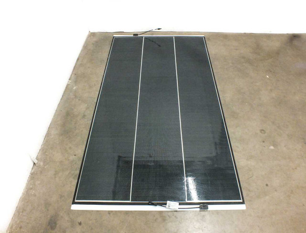 SoloPower SP3L-200 200W flexible solar panel laid flat, overhead view showing three-column CIGS cell layout and MC4 junction box
