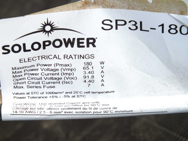 SoloPower SP3L-180 rating label close-up showing full electrical specifications: 180W Pmax, 65.1V Vmp, 3.40A Imp, 91.8V Voc, 4.40A Isc, 7A max series fuse