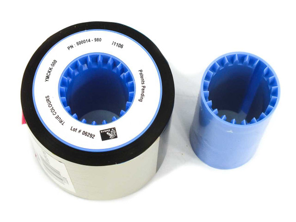 Zebra YMCKK-500 ribbon spool next to blue take-up core, side view showing label