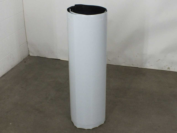 Xunlight XRD12-100 flexible amorphous solar panel rolled up and standing vertically, showing compact rolled storage configuration with white ETFE backing visible