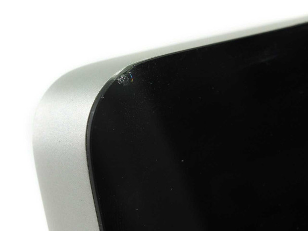 Close-up of iMac MC309LL/A glass panel top-left corner showing chip and paint damage