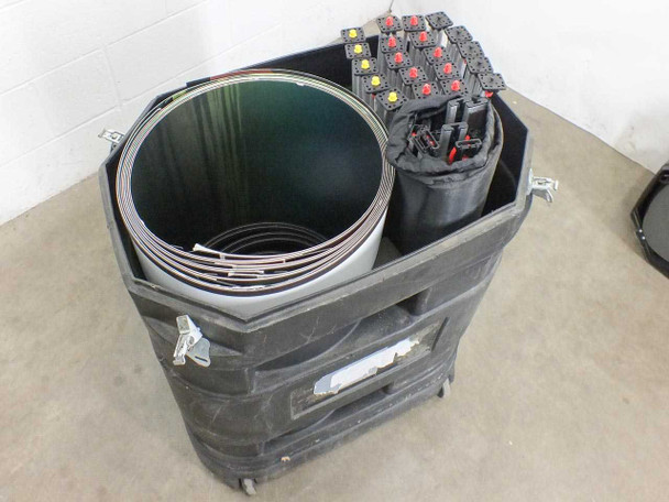 Apex 9904-QS rolling hard case open, showing rolled graphic panels and spotlight accessories inside