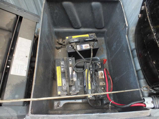 Nilfisk-Advance 3800 battery compartment open – multiple 36V batteries visible with wiring and interconnects