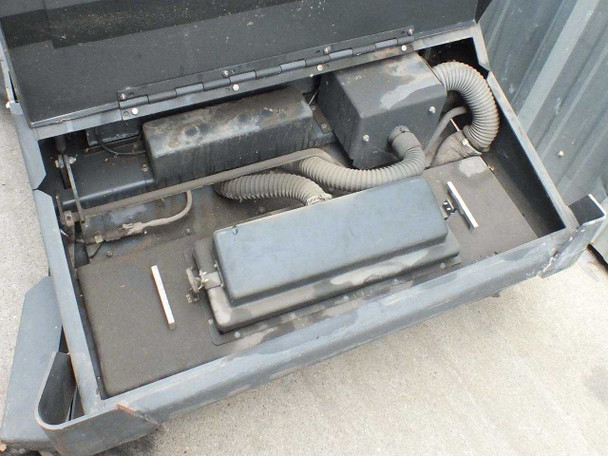 Nilfisk-Advance 3800 interior compartment open – vacuum/filter housing, flexible hose, and internal components visible