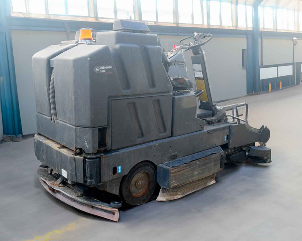 Nilfisk-Advance 3800 Floor Scrubber – rear three-quarter view showing recovery tank, steering column, and amber warning light