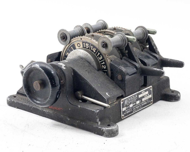 Moviola SYB 2-gang 35mm film synchronizer – three-quarter front-left view showing sprocket wheels, guide rollers, and manufacturer nameplate