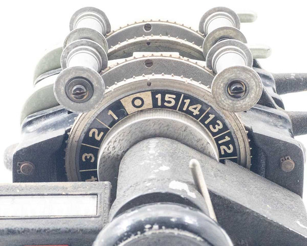 Moviola SYB synchronizer – top-down view showing numbered frame-count dial with markings 0 through 15 and sprocket roller assemblies