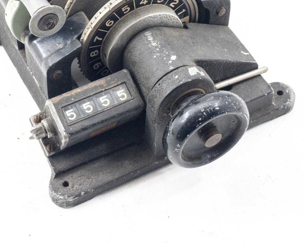Moviola SYB synchronizer – close-up of 4-digit Veeder-Root counter reading 5555 and hand crank knob with paint chips visible on housing