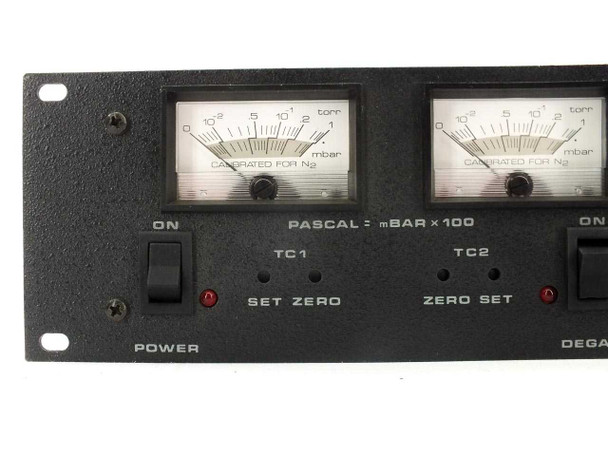 Close-up of Granville Phillips 270 front panel left section — dual thermocouple gauge meters calibrated for N₂ in Pascal/mBar×100 and Torr, TC1/TC2 labels, POWER switch, SET ZERO and ZERO SET controls
