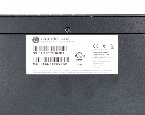 Araknis AN-310-RT-4L2W bottom label showing model, serial number, MAC address, UL listing, input specs 100-240VAC 50-60Hz 0.65A