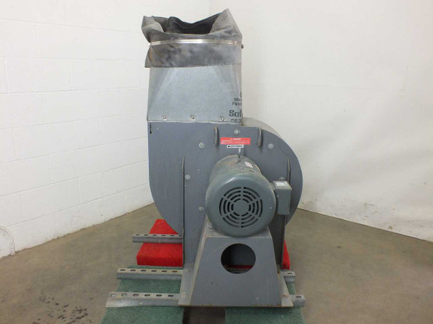Cincinnati Fan HDBI-150 centrifugal fan left side profile view with Cincinnati Fan nameplate label visible on housing and Baldor motor with red warning sticker, unit on floor