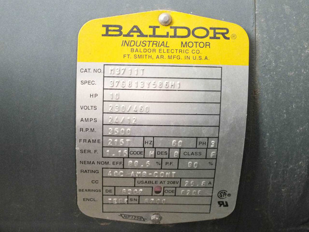Baldor motor nameplate showing CAT NO M3711T, 10HP, 230/460V, 24/12A, 3500 RPM, Frame 215T, 3-Phase, 60Hz, Class F insulation, NEMA efficiency 90.5%, service factor 1.15, continuous duty rating
