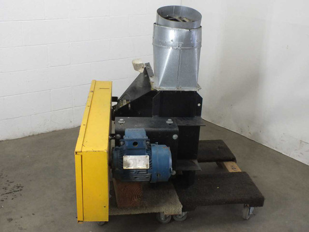 Chicago Blower Size 9 fan left-side profile view showing Siemens PE 21 Plus blue motor and yellow inlet guard — unit resting on rolling wooden pallet