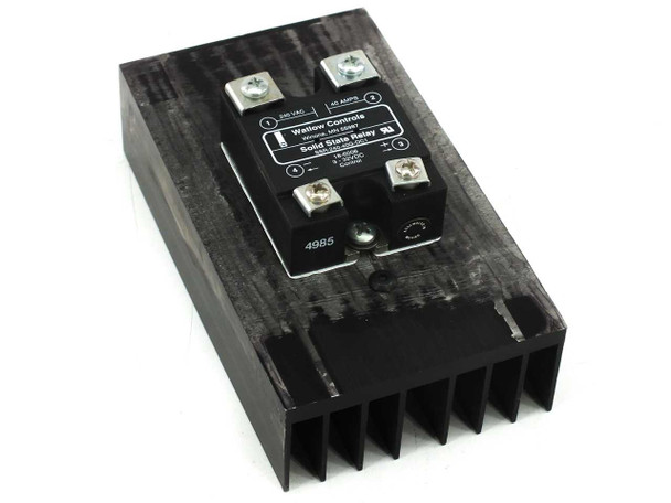 Watlow SSR-240-40G-DC1 Solid State Relay mounted on black aluminum heatsink — front angled view showing label and load terminals