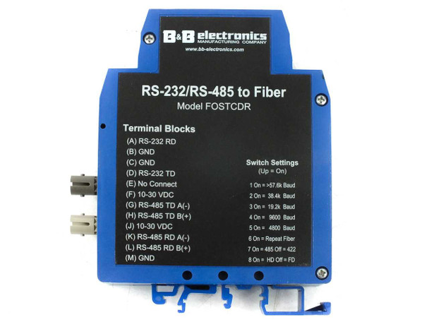 B&B Electronics FOSTCDR front panel close-up showing RS-232/RS-485 to Fiber label, terminal block wiring diagram, and switch settings